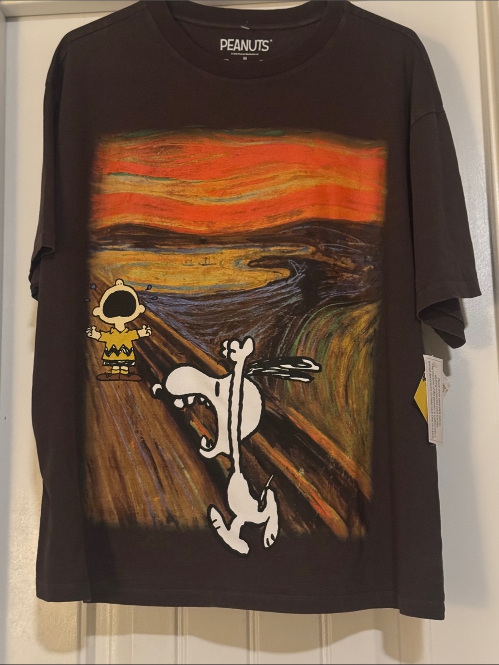 NWT Peanuts Brown T-shirt w/ Snoopy &Charlie in “The Scream” SZ M loose fit
